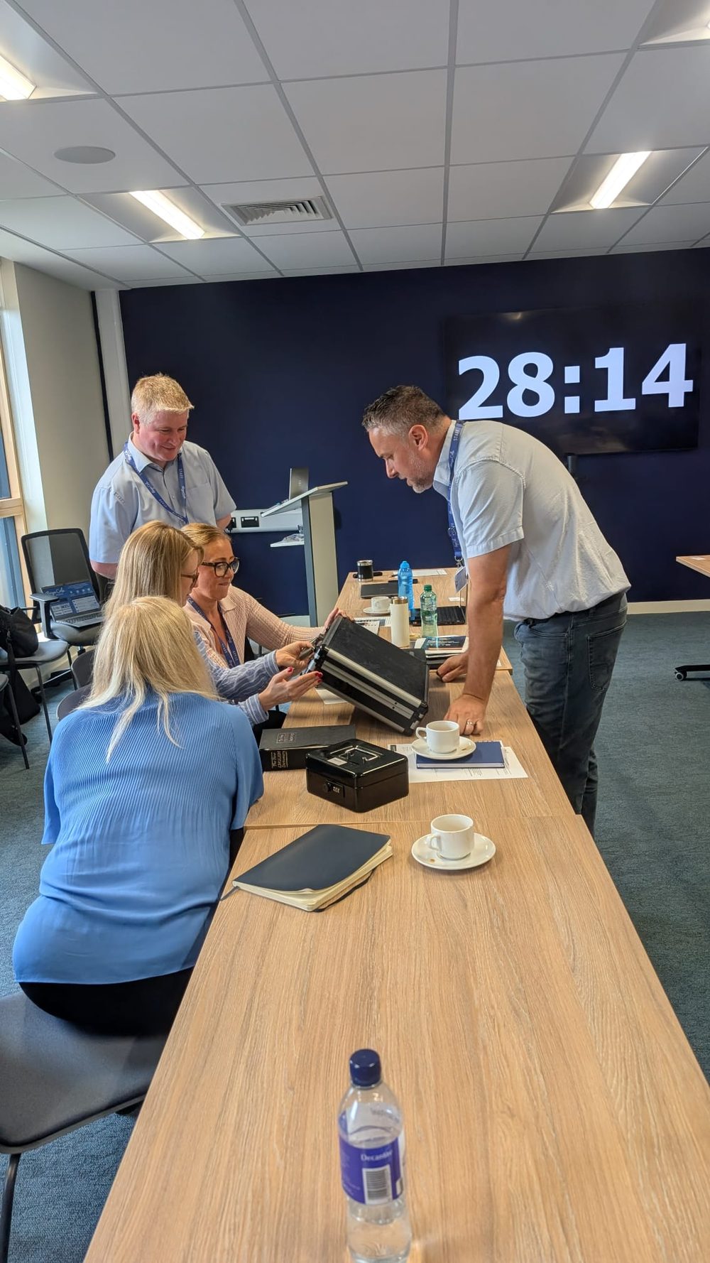 Hospice staff working through the cyber escape room challenge